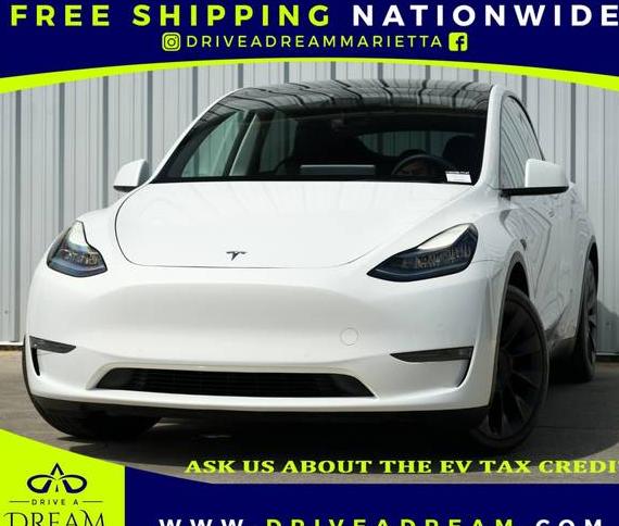 TESLA MODEL Y 2021 5YJYGDED9MF120338 image